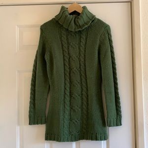 Green turtleneck sweater